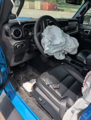 2024 Jeep Wrangler 4-Door Sahara 4x4 - Interior Steering Wheel With Keys Image